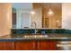 Modern kitchen with stainless steel sink and dark wood cabinets at 361 17Th St # 2001, Atlanta, GA 30363