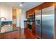 Modern kitchen with stainless steel appliances and dark wood cabinets at 361 17Th St # 2001, Atlanta, GA 30363