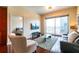 Living room with hardwood floors and city view at 361 17Th St # 2001, Atlanta, GA 30363