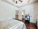 Spacious bedroom with hardwood floors and access to a private bathroom at 1891 Prospect Church Rd, Lawrenceville, GA 30043