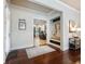 Bright entryway with built-in bench seating and hardwood floors at 1891 Prospect Church Rd, Lawrenceville, GA 30043