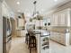 Spacious kitchen with granite countertops, stainless steel appliances, and large island at 1891 Prospect Church Rd, Lawrenceville, GA 30043