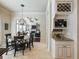 Kitchen breakfast area with a round table and built in coffee bar at 1891 Prospect Church Rd, Lawrenceville, GA 30043