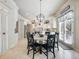 Kitchen features a round dining table and French doors at 1891 Prospect Church Rd, Lawrenceville, GA 30043