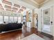 Living area with hardwood floors, fireplace, and built-in shelving at 1891 Prospect Church Rd, Lawrenceville, GA 30043