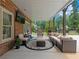 Covered patio with seating area and view of backyard at 1891 Prospect Church Rd, Lawrenceville, GA 30043
