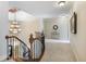Upper hall with chandelier and carpeted floor at 1891 Prospect Church Rd, Lawrenceville, GA 30043