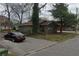 One story home with overgrown landscaping and needs updating at 868 Oakhill Sw Ave, Atlanta, GA 30310