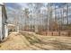 Large backyard with wooded area and privacy fence at 66 Vicky Way, Douglasville, GA 30134