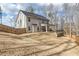 Spacious backyard with a large grassy area and wooden fence at 66 Vicky Way, Douglasville, GA 30134