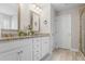 Spacious bathroom with double vanity, granite countertop, and a walk-in shower at 66 Vicky Way, Douglasville, GA 30134