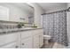 Clean bathroom with a shower/tub combo and granite countertop at 66 Vicky Way, Douglasville, GA 30134