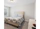 Spacious bedroom with a king-size bed and neutral decor at 66 Vicky Way, Douglasville, GA 30134
