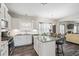 Spacious kitchen with a large island, white cabinets, and granite countertops at 66 Vicky Way, Douglasville, GA 30134