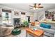 Bright living room with comfy seating and wood coffee table at 44 Browns Ct, Powder Springs, GA 30127