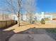 Spacious backyard with wood chip ground cover and privacy fence at 585 Briarhurst Ct, Lawrenceville, GA 30046