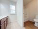 Bathroom with shower/tub combo and toilet at 585 Briarhurst Ct, Lawrenceville, GA 30046