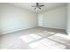 Spacious bedroom with neutral walls and carpet flooring at 585 Briarhurst Ct, Lawrenceville, GA 30046