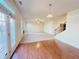 Bright dining area with hardwood floors and access to backyard at 585 Briarhurst Ct, Lawrenceville, GA 30046