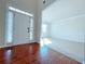 Bright entryway with hardwood floors and views into the living room at 585 Briarhurst Ct, Lawrenceville, GA 30046