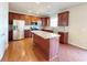Modern kitchen with granite countertops and stainless steel appliances at 585 Briarhurst Ct, Lawrenceville, GA 30046