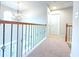 Open railing overlooks main floor at 585 Briarhurst Ct, Lawrenceville, GA 30046
