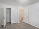 Bedroom with grey flooring and access to bathroom at 6945 Brown S Dr, Fairburn, GA 30213