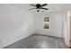Simple bedroom with grey flooring and a window at 6945 Brown S Dr, Fairburn, GA 30213