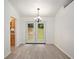 Bright dining room with french doors leading to the backyard at 6945 Brown S Dr, Fairburn, GA 30213