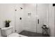 Clean bathroom with walk-in shower and dark gray floor at 2199 Lenox Ne Rd # 9, Atlanta, GA 30324