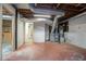 Unfinished basement with HVAC system and storage space at 256 Sharney Ne Ln, Kennesaw, GA 30144