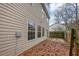 Simple backyard with a small patio and wooden fence at 3542 Brookstone Way, Union City, GA 30291
