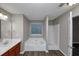 Bathroom boasts a garden tub, shower, and double vanity at 3542 Brookstone Way, Union City, GA 30291
