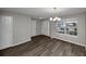Bright dining room with gray walls and wood-look flooring at 3542 Brookstone Way, Union City, GA 30291
