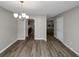 Open dining room with view into kitchen and living room at 3542 Brookstone Way, Union City, GA 30291