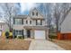 Two-story house with attached garage and neat landscaping at 3542 Brookstone Way, Union City, GA 30291