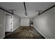 Spacious garage with ample storage space and clean concrete floor at 3542 Brookstone Way, Union City, GA 30291