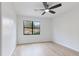 Bright bedroom with hardwood floors and wainscoting at 1129 Gate Post Ln, Lawrenceville, GA 30044