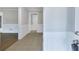 Bright entryway with tile flooring and white wainscoting at 1129 Gate Post Ln, Lawrenceville, GA 30044