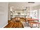 Spacious kitchen with a large island and an adjacent dining area with a view to the backyard at 6355 Indian Acres Trl, Tucker, GA 30084