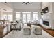 Bright living room with fireplace, hardwood floors, and neutral decor at 6355 Indian Acres Trl, Tucker, GA 30084