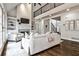 Bright living room boasts high ceilings, fireplace, and access to the upstairs at 6355 Indian Acres Trl, Tucker, GA 30084