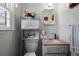 Small bathroom with updated vanity and pink sink at 1155 Casteel Rd, Powder Springs, GA 30127