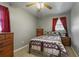 Cozy bedroom with metal bed frame, dresser, and carpet flooring at 1155 Casteel Rd, Powder Springs, GA 30127