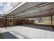 Covered carport with concrete parking area and backyard access at 1155 Casteel Rd, Powder Springs, GA 30127