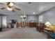 Living room with rocking chairs and wood paneling at 1155 Casteel Rd, Powder Springs, GA 30127