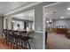 Open floorplan featuring a breakfast bar connecting to a large living room with views of the front entrance at 1155 Casteel Rd, Powder Springs, GA 30127