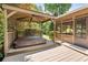 Back deck area with gazebo and hot tub, great for entertaining at 6006 Lanier Heights Cir, Buford, GA 30518