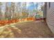 Landscaped backyard with wooden privacy fence at 4025 Casa Verde Dr, Atlanta, GA 30349
