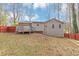 House exterior showcasing a deck and fenced backyard at 4025 Casa Verde Dr, Atlanta, GA 30349